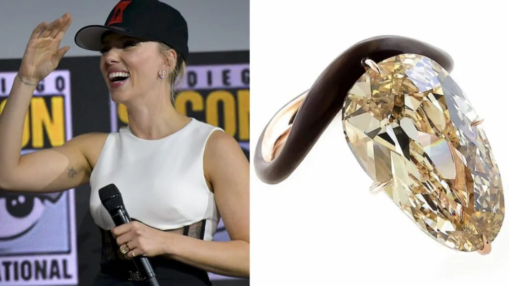 Скарлетт Йоханссон была замечена в массивном помолвочном кольце с коричневым бриллиантом на прошлогоднем Comic-Con. (Фотографии: Chris Delamas/ AFP, Taffin Jewelry)